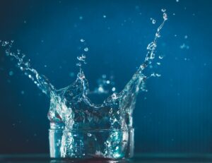 water splash in clear drinking glass